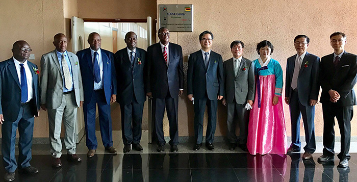 Agriculture Minister Joseph Made (fifth from left) and Administrator Chung Hwang-keun (fifth from right) pose at the opening ceremony of KOPIA Zimbabwe center at Harare, Zimbabwe on Dec. 9.